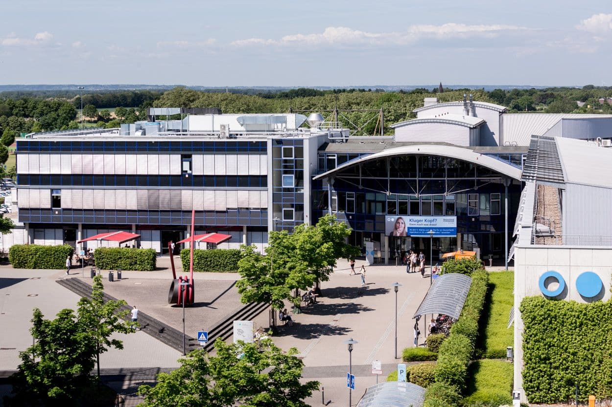 Campus view of Bonn-Rhein-Sieg University of Applied Sciences (H-BRS) showing modern academic buildings and student facilities.