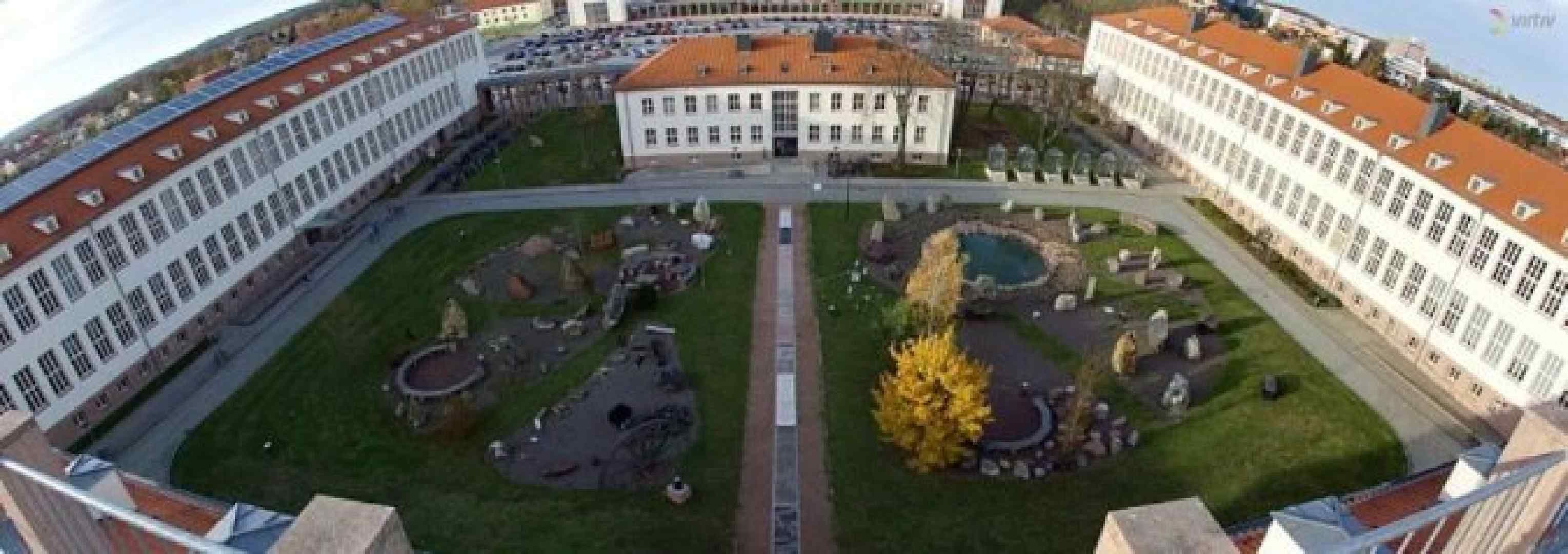 Martin Luther University Halle-Wittenberg campus view, showing historic and modern academic buildings and student facilities, reflecting a strong tradition in research and education.