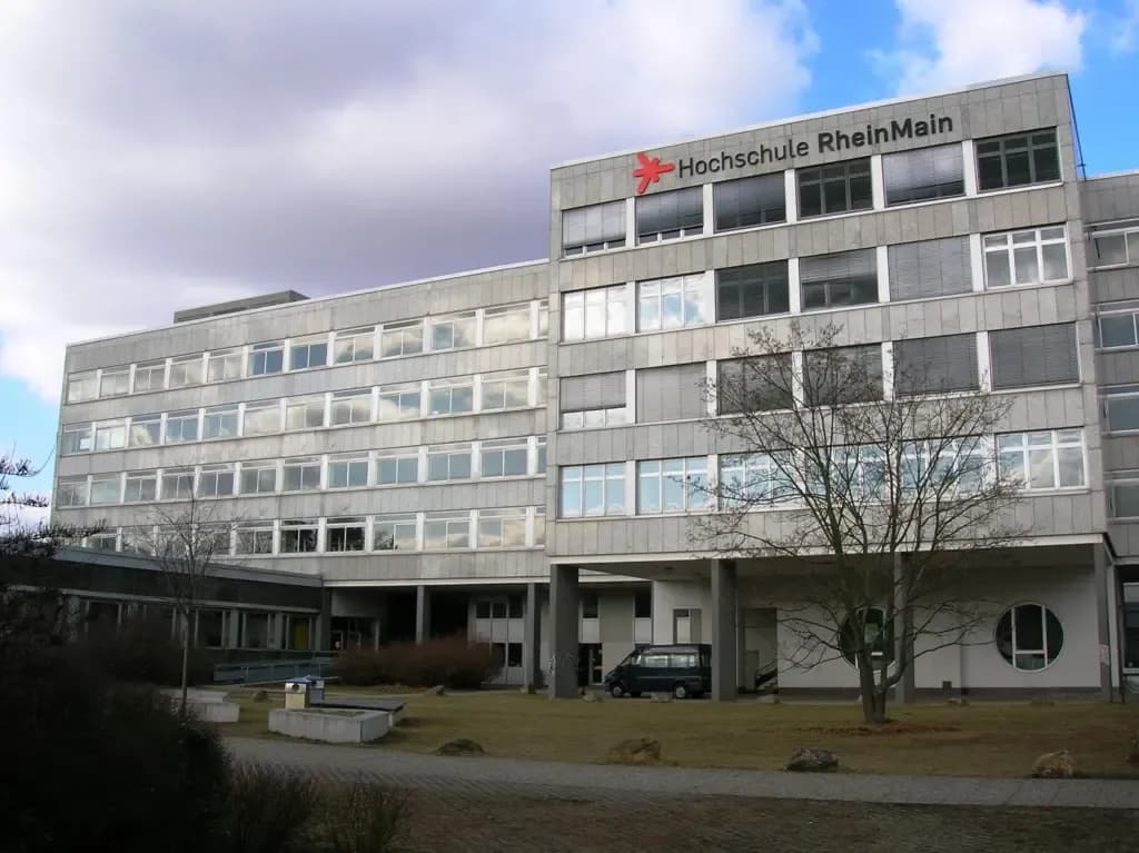 RheinMain University of Applied Sciences Wiesbaden campus view with students, modern architecture, and green spaces.