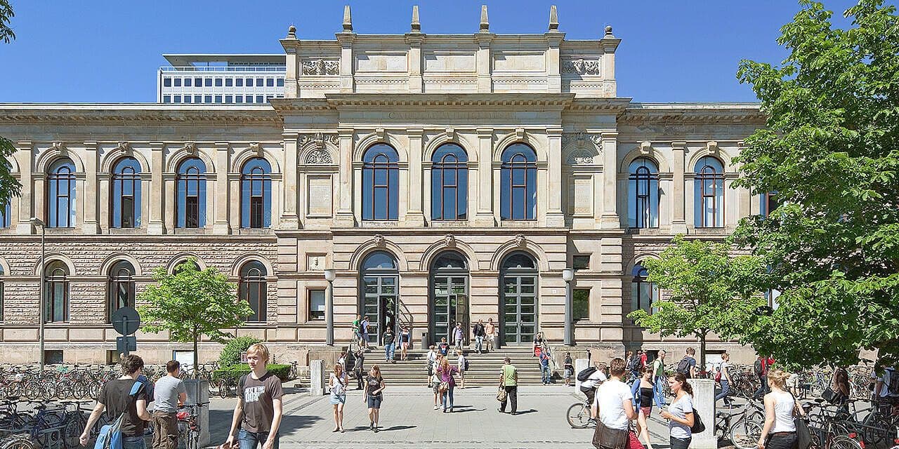 Main building of Technical University of Braunschweig, featuring modern architecture and green spaces on the urban campus.