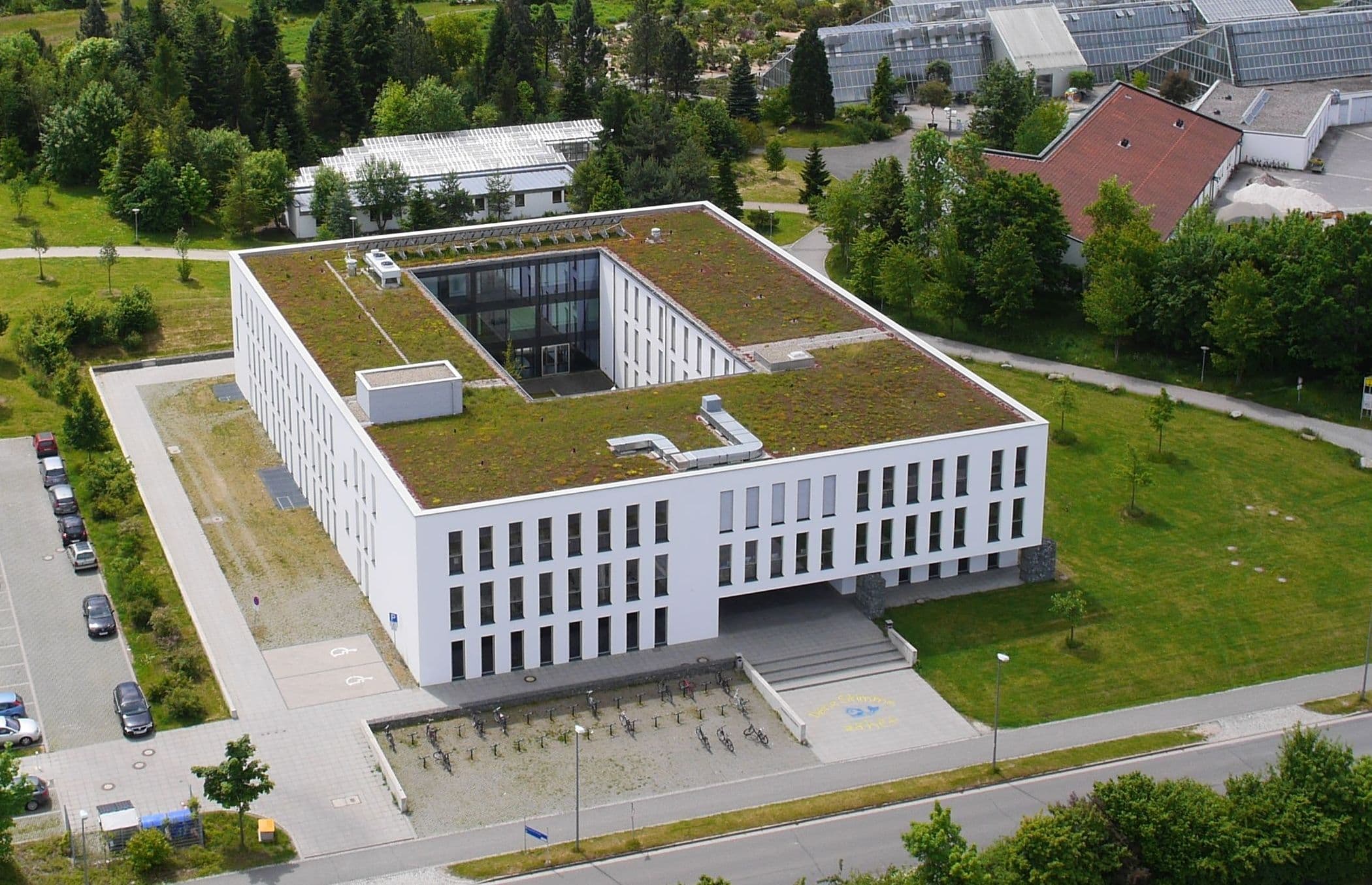 University of Bayreuth main campus with modern buildings and green spaces, showcasing its academic and research environment.