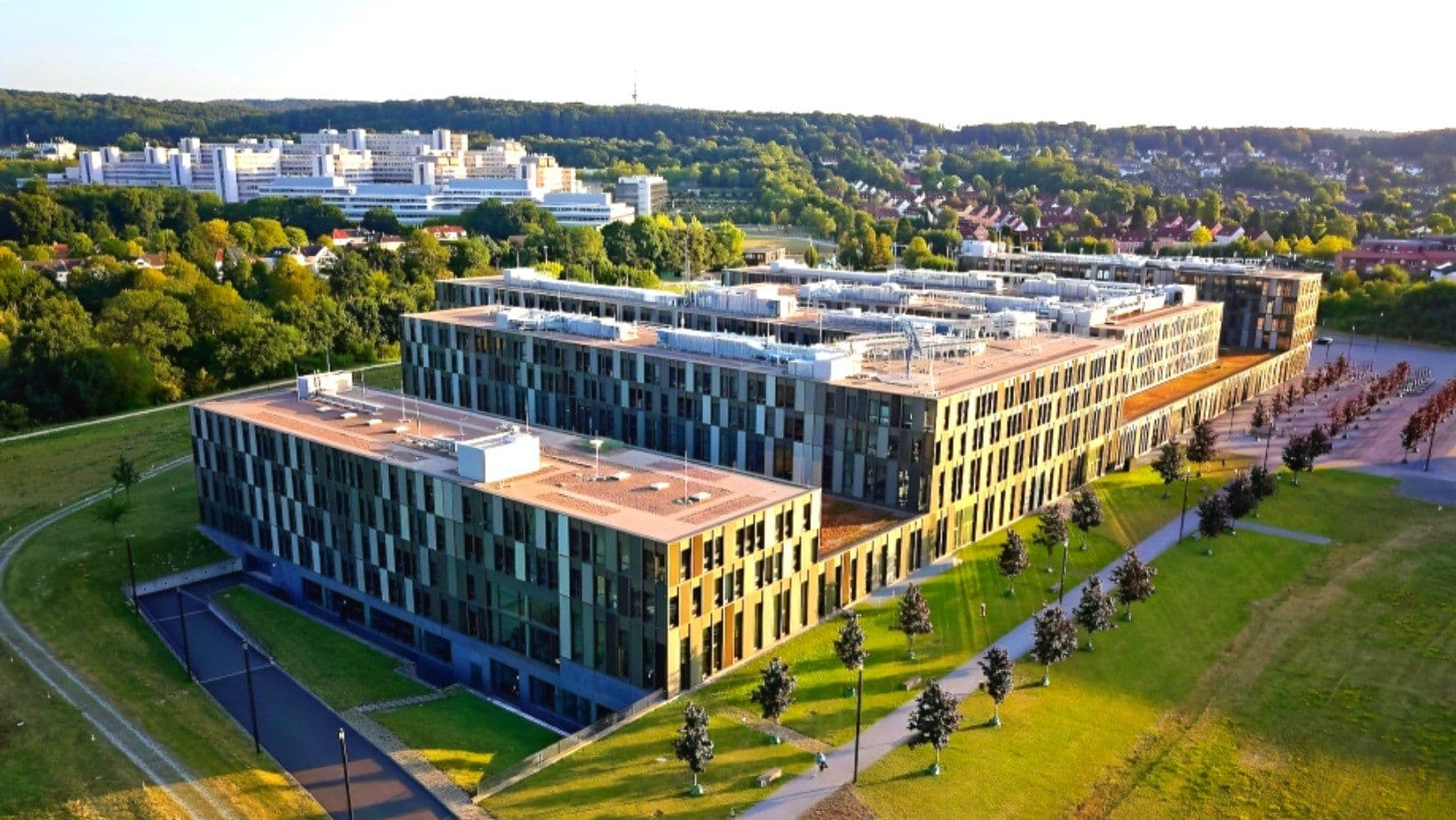 Campus view of Bielefeld University – University of Applied Sciences and Arts (HSBI) showing modern academic buildings and student facilities.