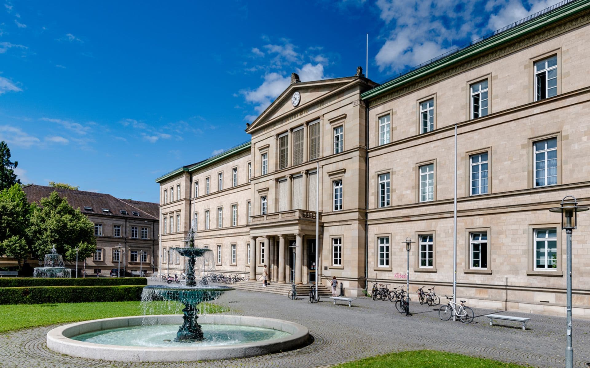 Campus view of Eberhard Karls University of Tübingen in Germany, showcasing historic and modern university buildings.