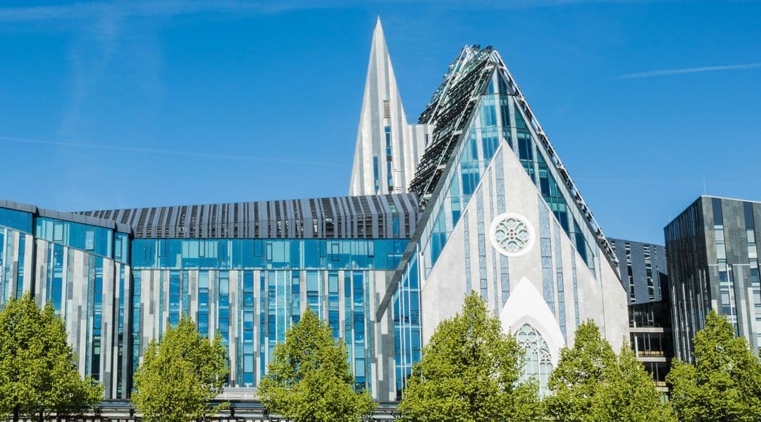 University of Leipzig main campus building with students and modern facilities in Leipzig, Germany